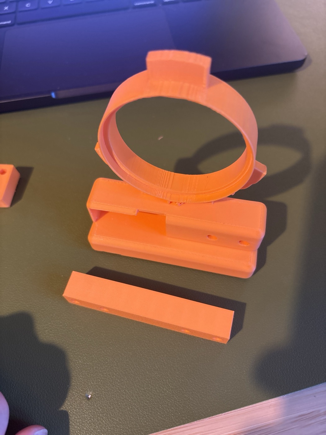 The first printed draft: an orange top ring, a long box and a separate bar